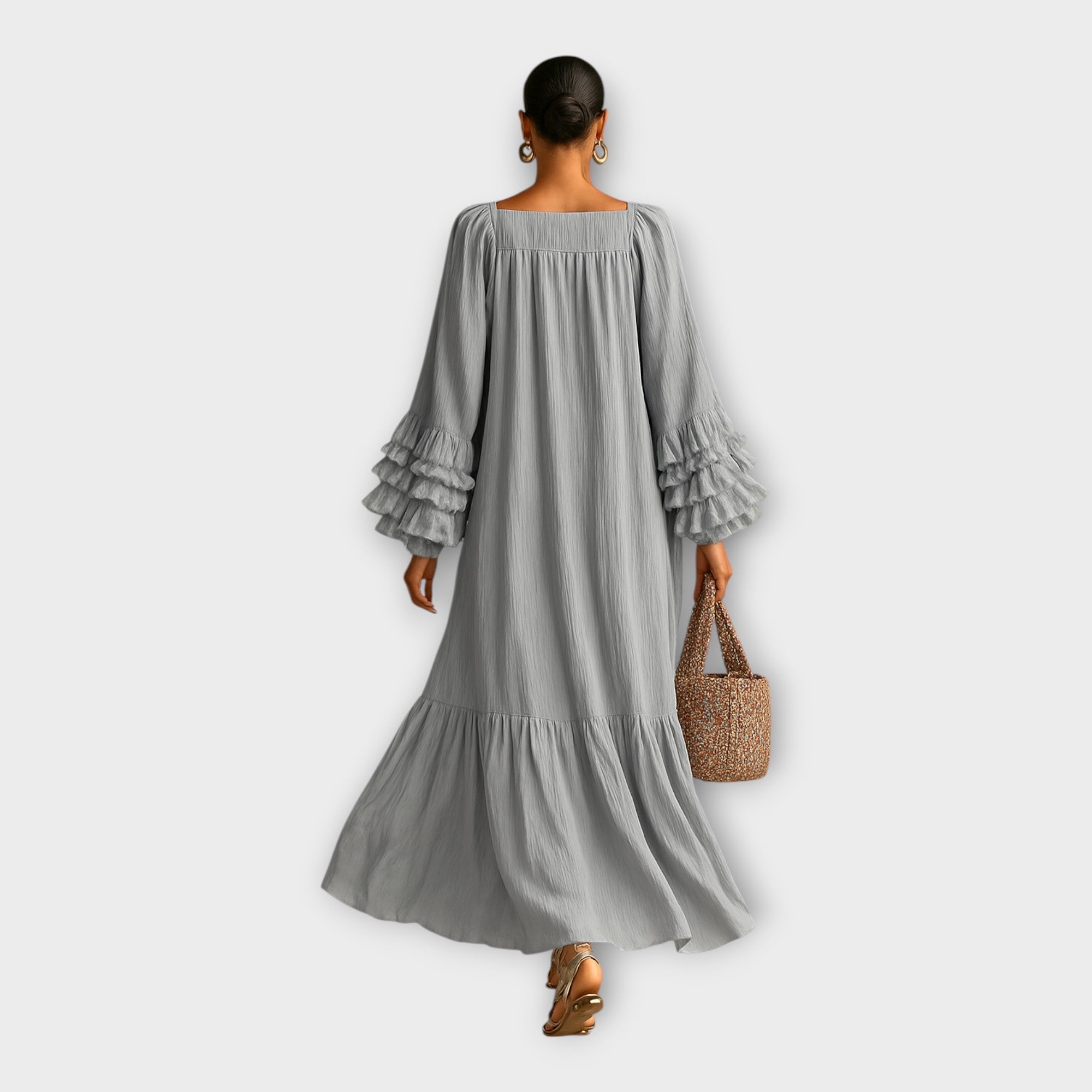 Luftigt langt kjole med elegante detaljer